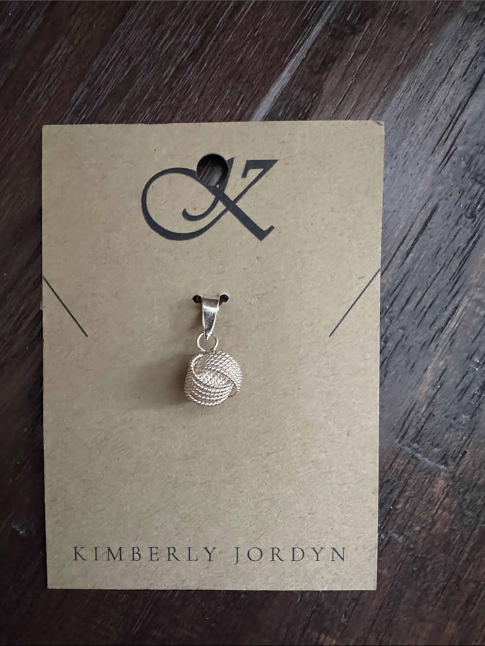 Sterling Silver Twisted Knot Pendantโ